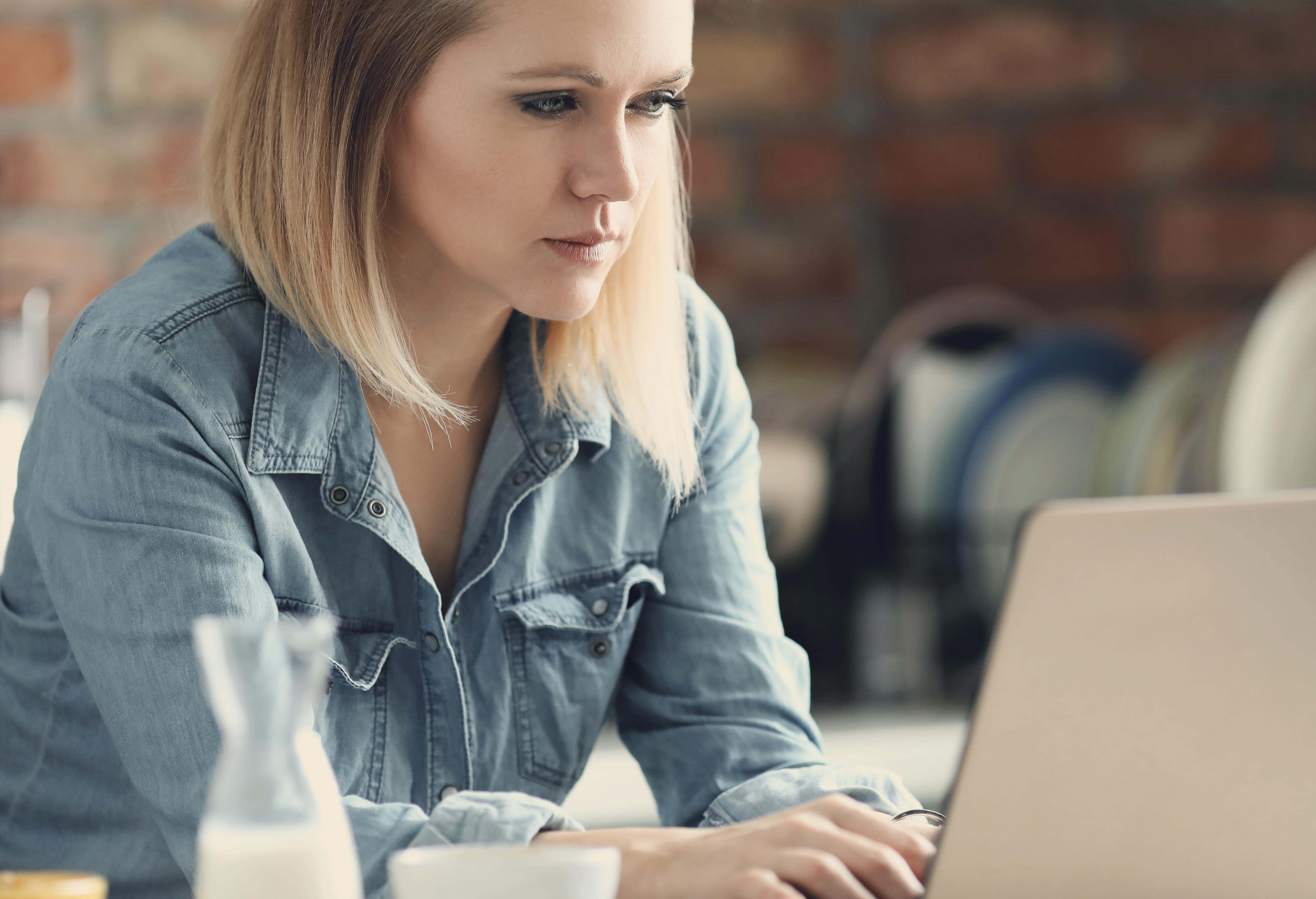 Woman staring at a computer screen | Source: Freepik