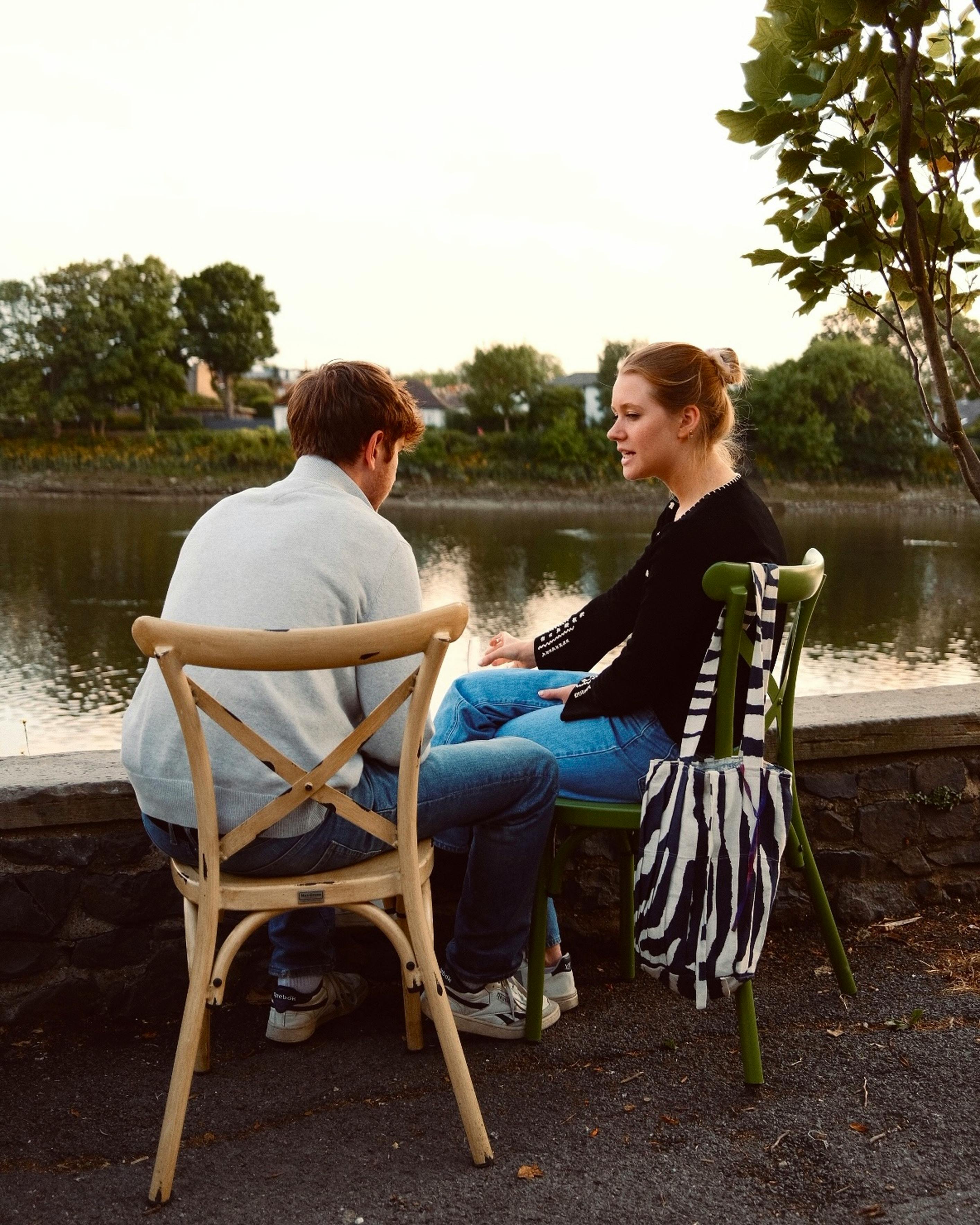 A woman looking unhappy while talking to a man | Source: Pexels