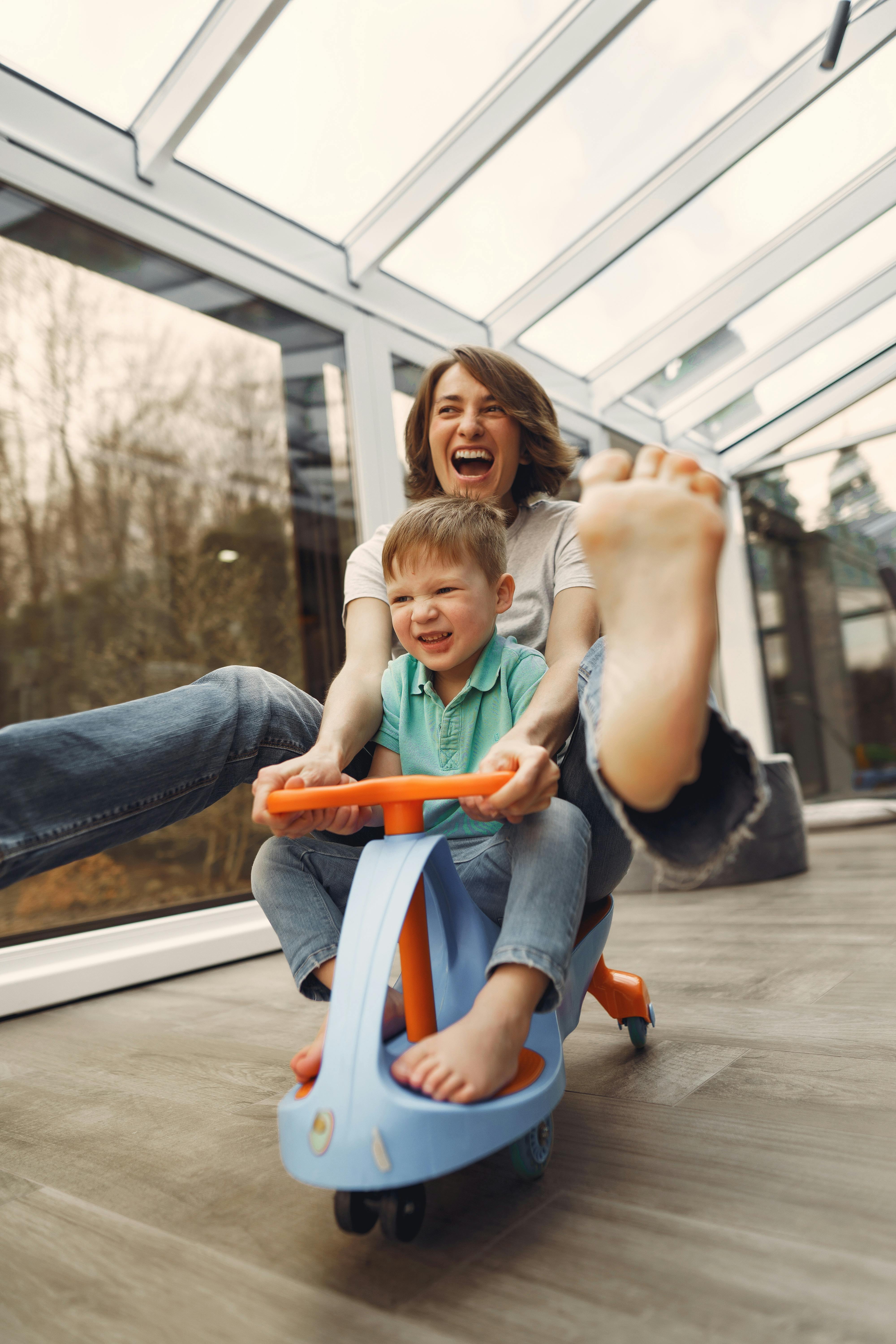 A happy woman playing with a child | Source: Pexels