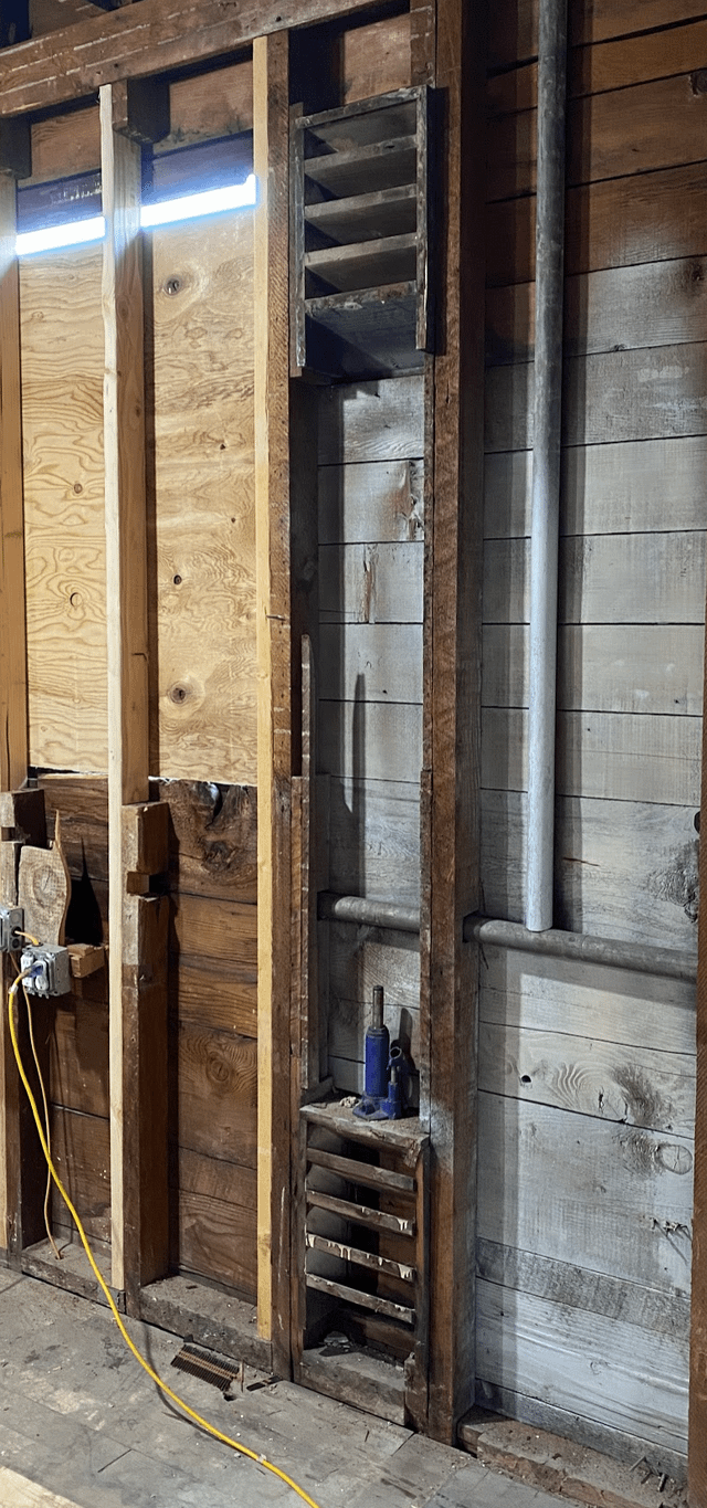 r/whatisthisthing - In-wall, wooden vent-like object between wall studs in ~100 year old house, but not open to the air outside