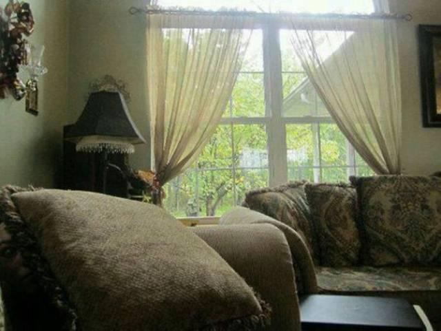  Tiny face peeping out of the sofa in the corner? That's not creepy at all