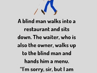 A blind man walks into a restaurant and sits down