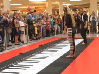 Woman Joins in on Man’s ‘Piano’ Playing and Crowd Can’t Get Enough