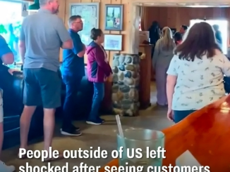 People outside of US left shocked after seeing customers inside restaurant when American national anthem plays