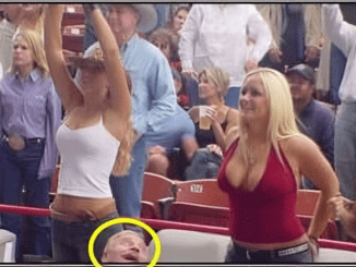 This is not just a random picture of fans in opening day of baseball game – Something is wrong with it can you spot it?