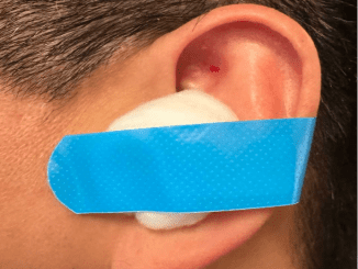 Place a cotton ball with VapoRub in your ear & get this effect