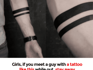 Armband tattoo on a man’s arm has a meaning…